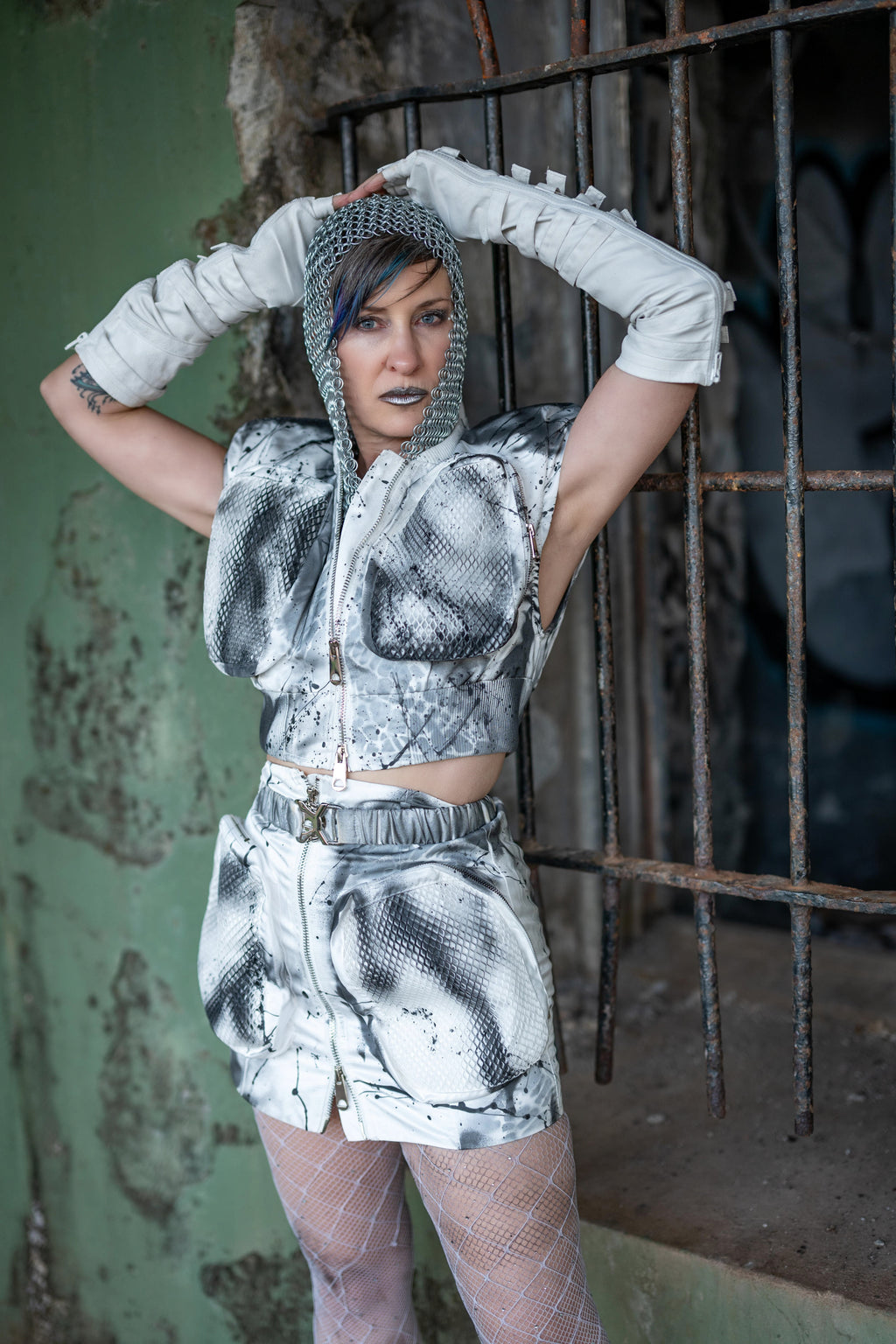Look 13 —  Sculpted Sleeveless Jacket & Mini Skirt Set