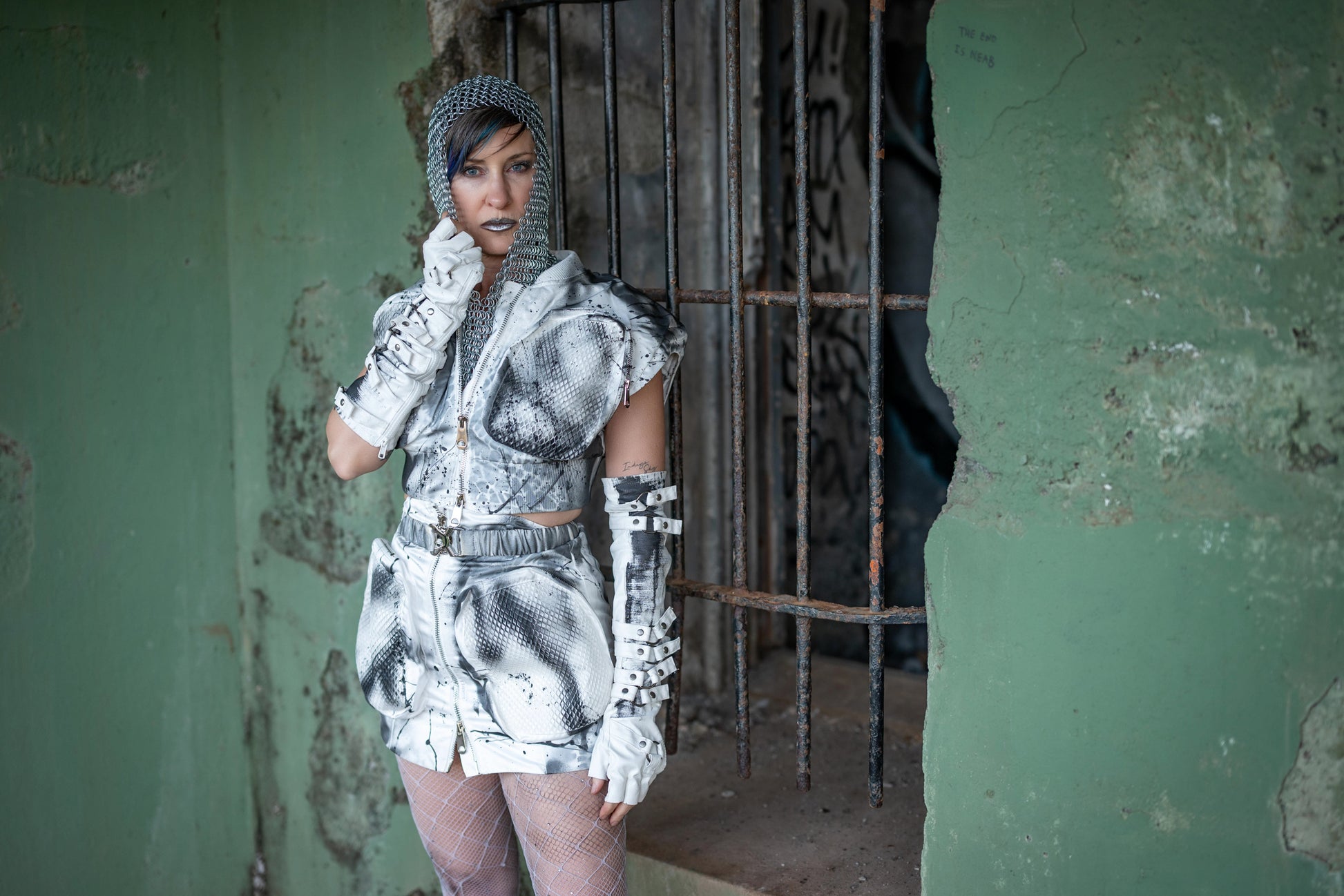 Look 13 —  Sculpted Sleeveless Jacket & Mini Skirt Set